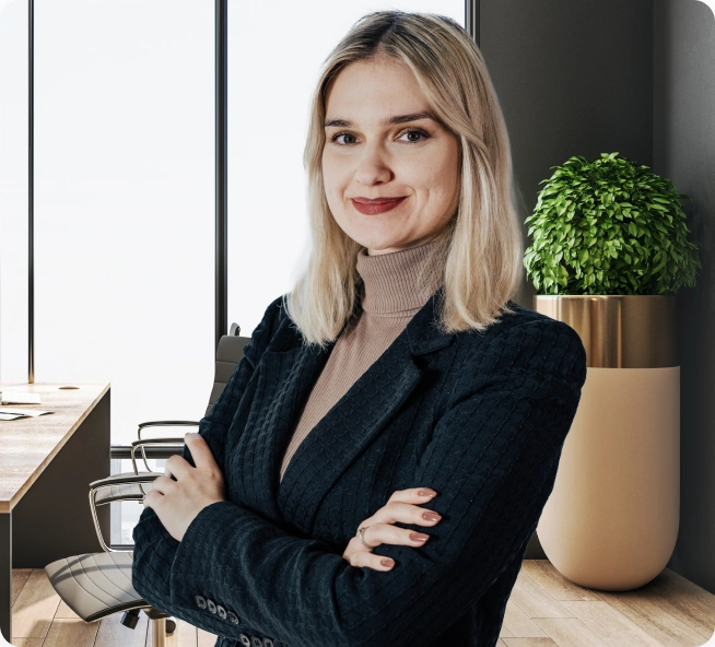 Aleksandra Bryniarska-Duda, adwokat specjalizująca się w sprawach dotyczących błędów medycznych, na tle stylowego biura.